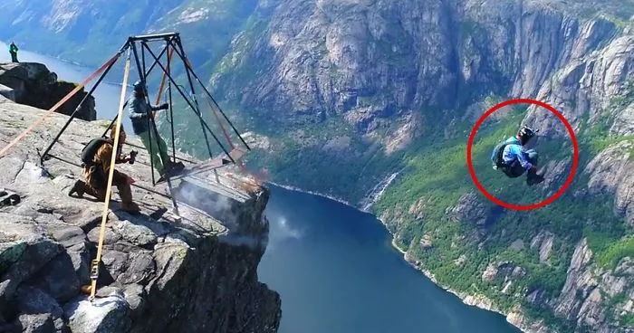 Base Jumping From Kjerag Cliff In Norway