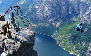 Base Jumping From Kjerag Cliff In Norway