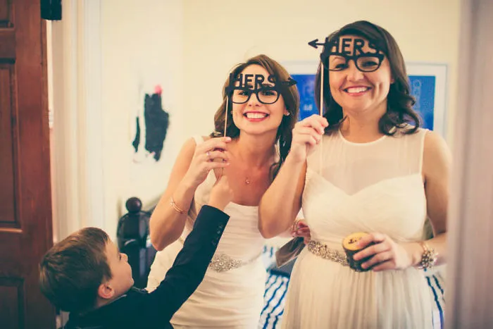 Two happy woman posing for a picture 