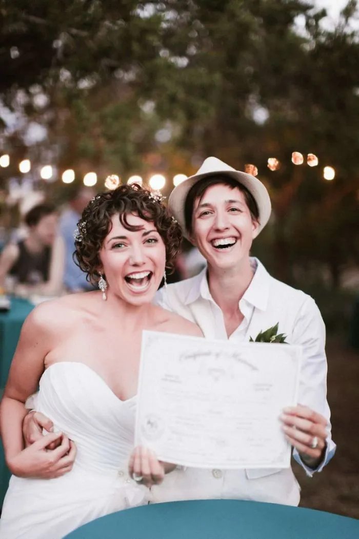 Two happy woman posing for a picture 