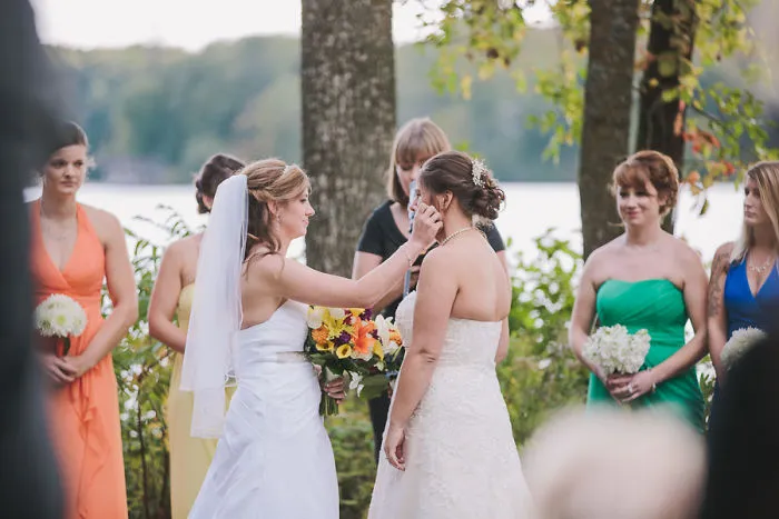 Two happy women looking at each other 
