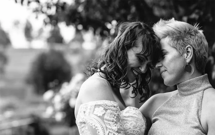 Two woman hugging 
