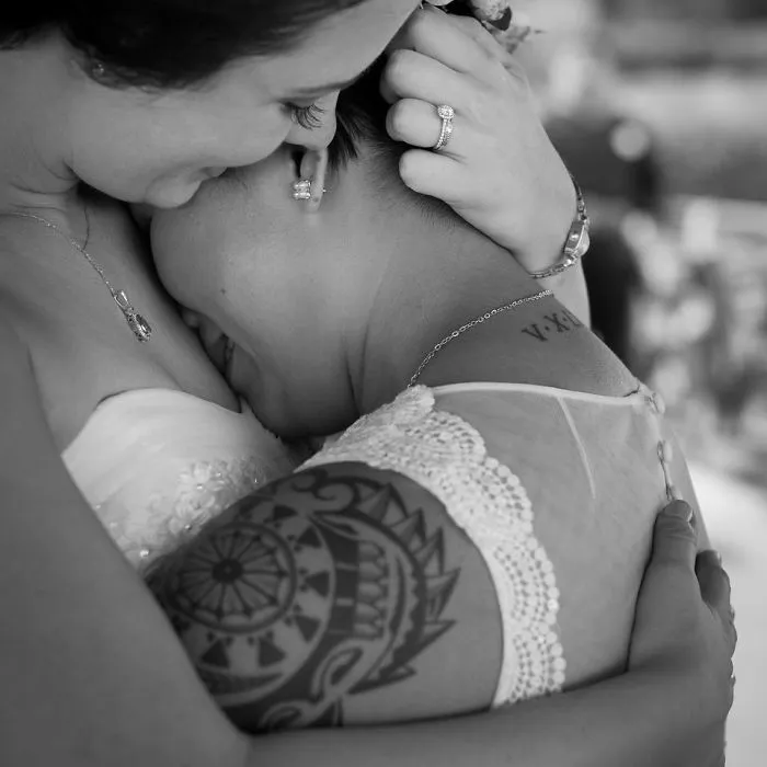 Two woman hugging 
