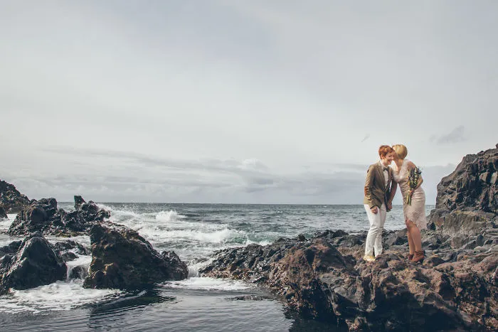 Two women hugging in the seaside 
