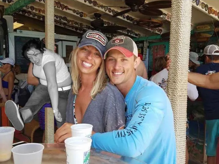 Couple Asks Internet To Photoshop Out Shirtless Guy From Engagement Photo, Regrets It Immediately