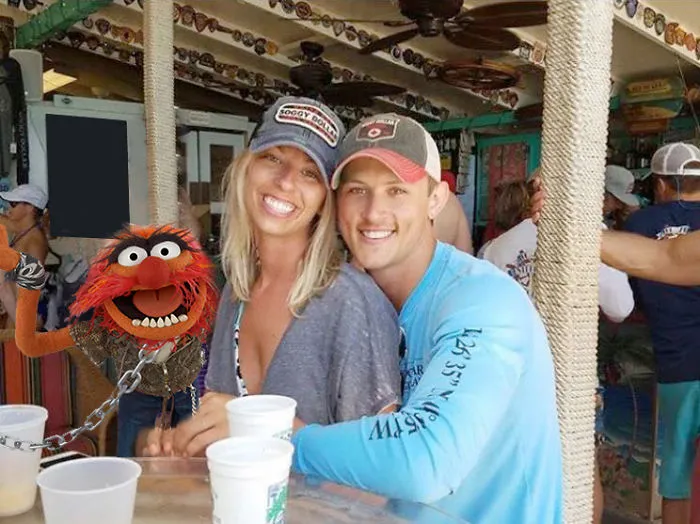 Couple Asks Internet To Photoshop Out Shirtless Guy From Engagement Photo, Regrets It Immediately