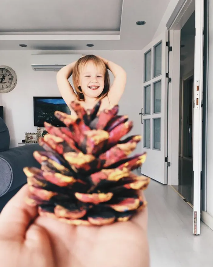 Mom "Dresses" Her Daughter In Food And Flowers Using Forced Perspective, Becomes Internet Star