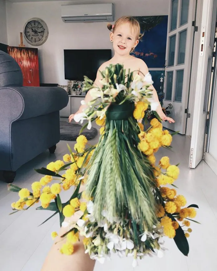 Mom "Dresses" Her Daughter In Food And Flowers Using Forced Perspective, Becomes Internet Star