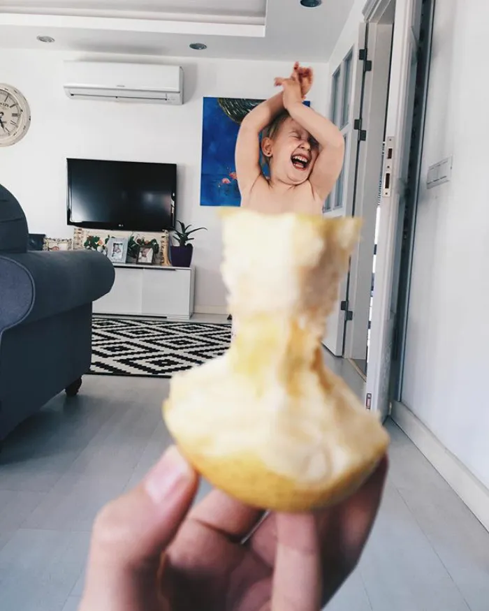 Mom "Dresses" Her Daughter In Food And Flowers Using Forced Perspective, Becomes Internet Star
