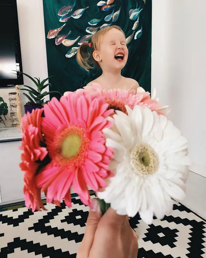 Mom "Dresses" Her Daughter In Food And Flowers Using Forced Perspective, Becomes Internet Star