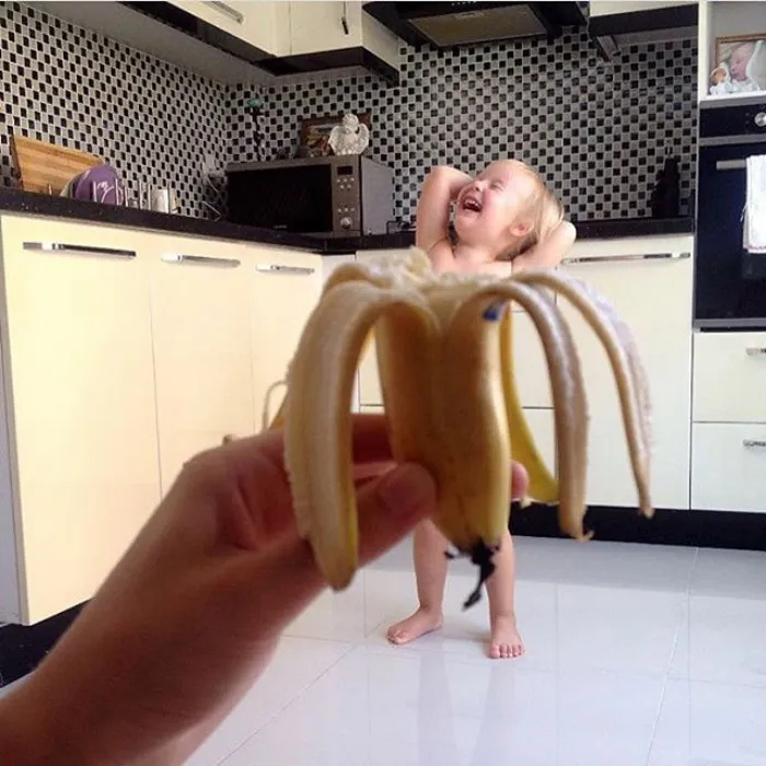 Mom "Dresses" Her Daughter In Food And Flowers Using Forced Perspective, Becomes Internet Star