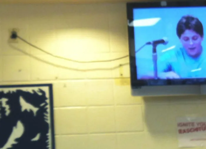 TV Cord Perfectly Lines Up With The Microphone Cord On The Screen