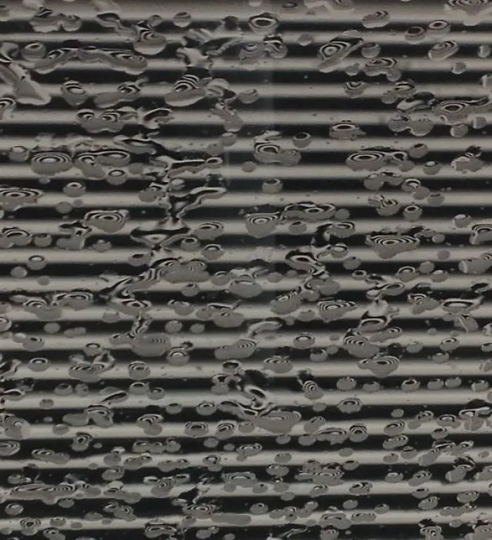 Rain Against Grate