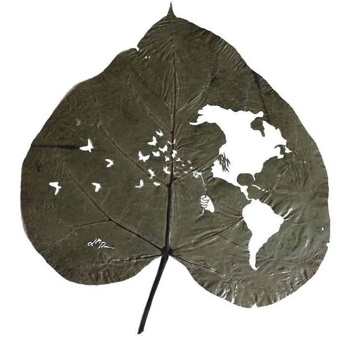 A Caterpillar Having Lunch Inspired Me To Start Creating Leaf Cutting Art