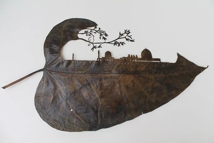 A Caterpillar Having Lunch Inspired Me To Start Creating Leaf Cutting Art