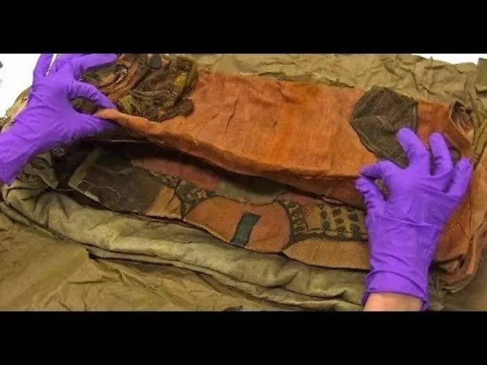Museum Staff Unwraps An Old Crumpled Parcel To Discover A 2,000 Year Old Secret