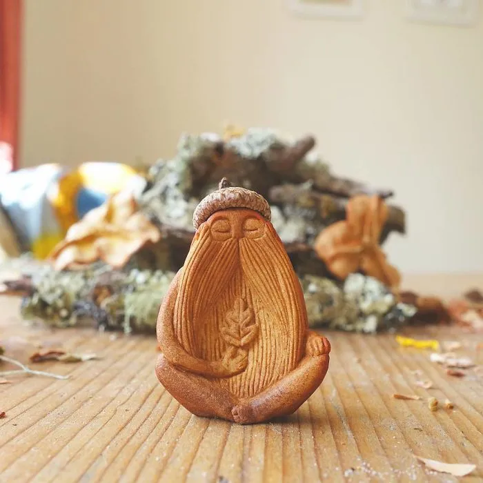 Most People Throw Away Avocado Pits, But This Artist Carves Them Into Magical Forest Creatures