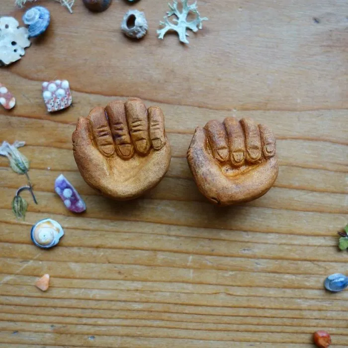 Most People Throw Away Avocado Pits, But This Artist Carves Them Into Magical Forest Creatures