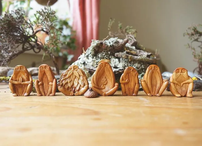 Most People Throw Away Avocado Pits, But This Artist Carves Them Into Magical Forest Creatures