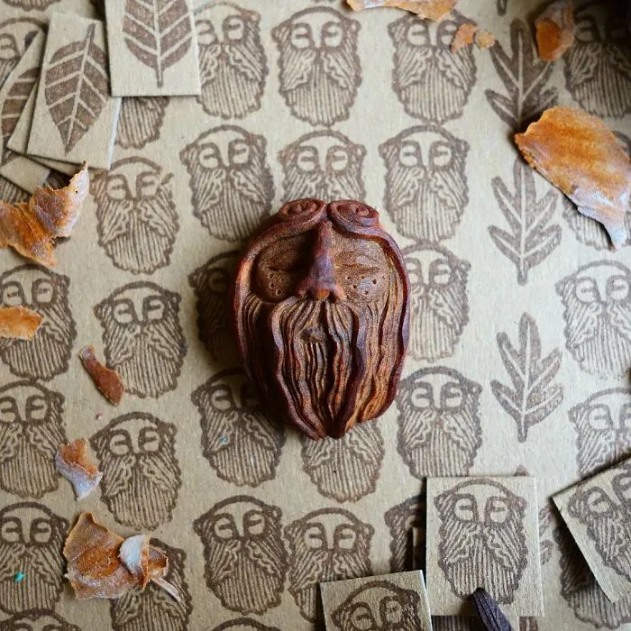 Most People Throw Away Avocado Pits, But This Artist Carves Them Into Magical Forest Creatures