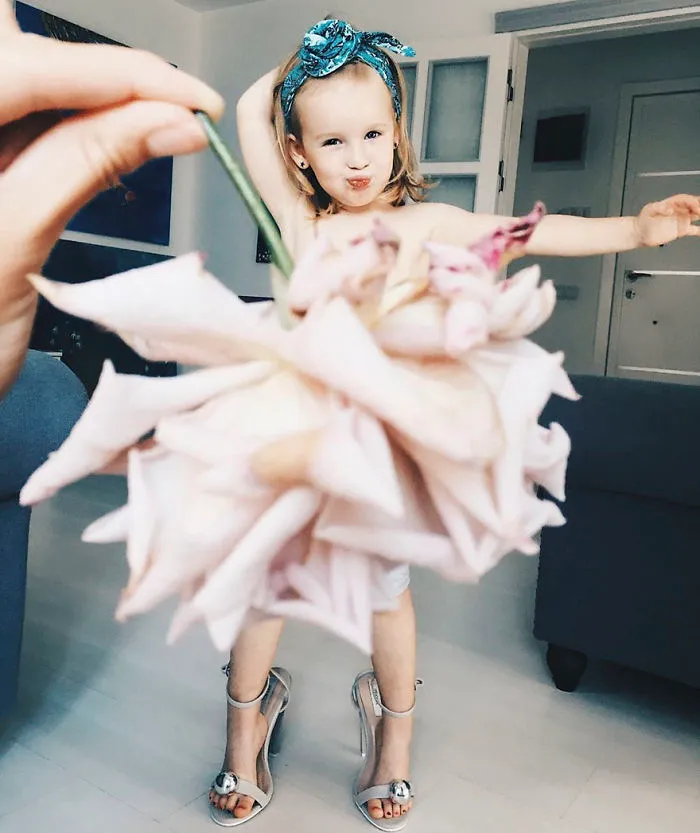 Mom "Dresses" Her Daughter In Food And Flowers Using Forced Perspective, Becomes Internet Star