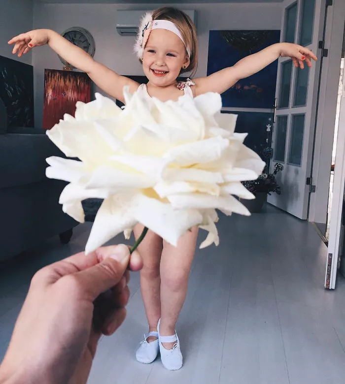 Mom "Dresses" Her Daughter In Food And Flowers Using Forced Perspective, Becomes Internet Star