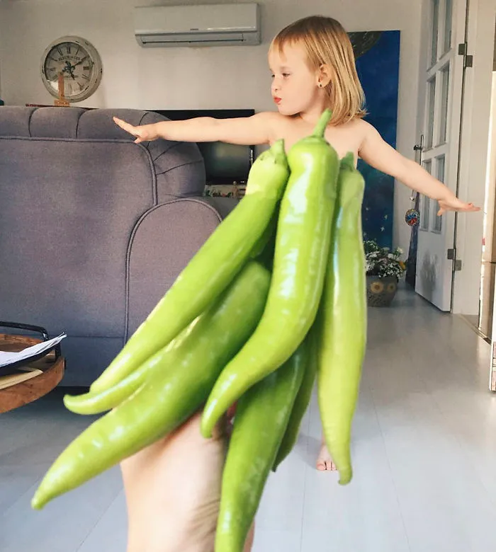 Mom "Dresses" Her Daughter In Food And Flowers Using Forced Perspective, Becomes Internet Star