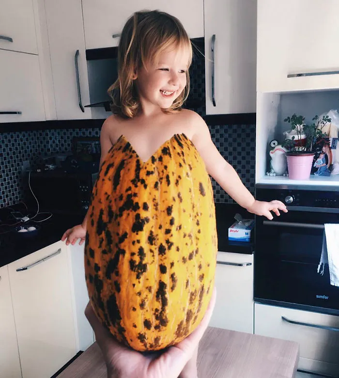 Mom "Dresses" Her Daughter In Food And Flowers Using Forced Perspective, Becomes Internet Star