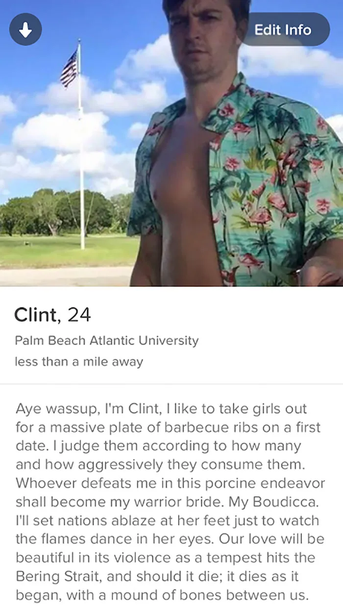Man in a floral shirt with a humorous Tinder profile in front of an American flag.