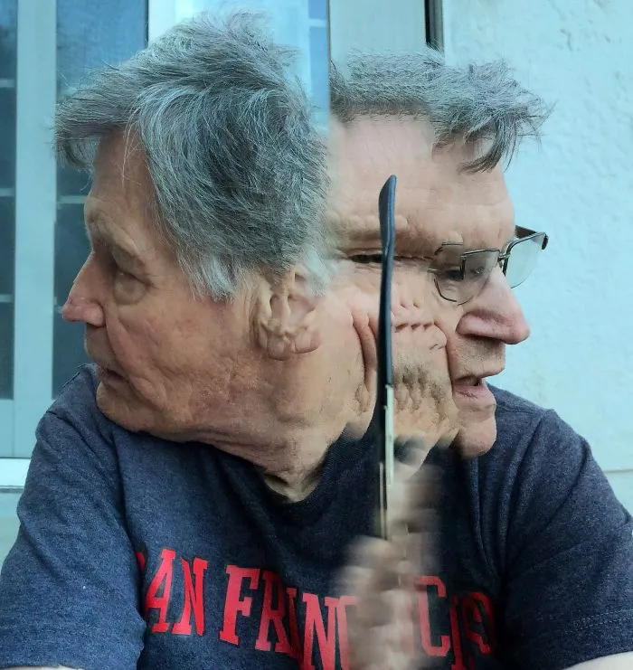 "merv Putting On His Glasses."  Roguepano.