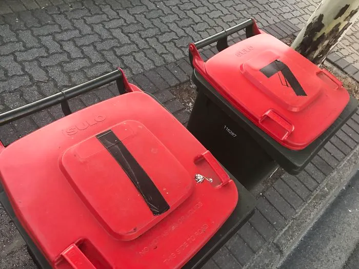 Last Week I Put A Piece Of Tape On My Bin Lid To Fix A Crack. My 92-Year-Old Neighbor Obviously Thought We Were Labelling Our Bins With Our Unit Numbers