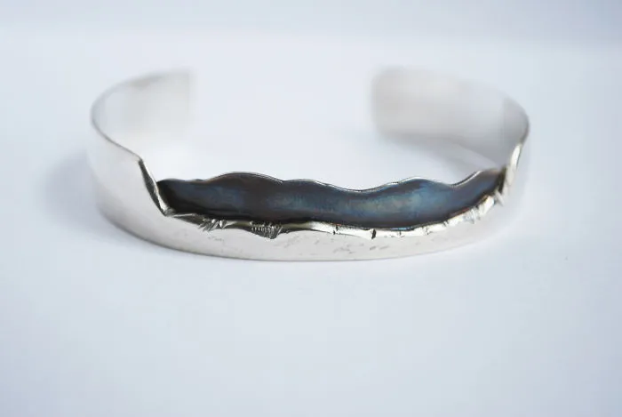 I'm A Metalsmith Making Custom Bracelets Of Mountains Using Sterling Silver