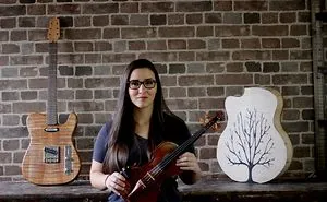 This Girl Handcrafts One Of A Kind Art Guitars
