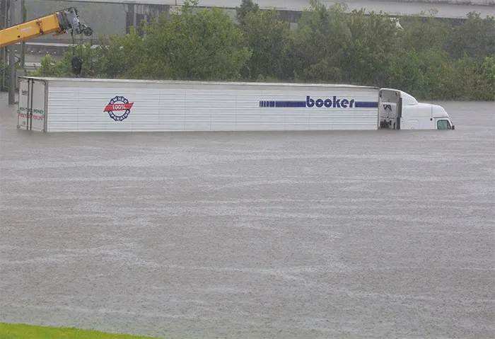 An Eighteen Wheel Tractor Trailer Is Stranded On Interstate Highway 45 Which Is Submerged From The Effects Of Hurricane Harvey Seen During Widespread Flooding In Houston, Texas