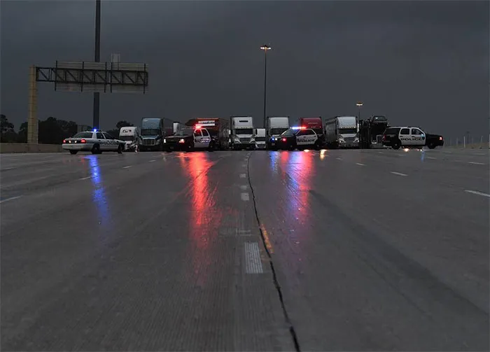 Police Block Traffic Following Closure Of The I-10 Freeway Leading Into Houston