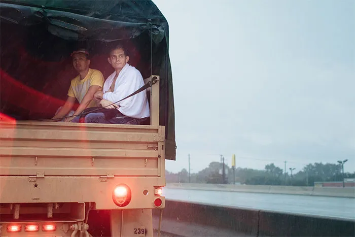People Who Were Rescued From Houston’s Meyerland Neighborhood On Sunday Waited To Be Taken To A Shelter