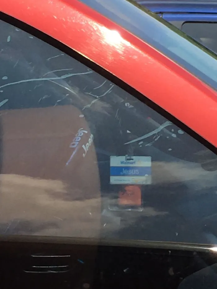 On Our Way To An Amusement Park When We See A Man Holding A Sign Saying "Jesus Is This Way". Start Joking That Jesus Is At The Amusement Park. This Is What We Park Next To