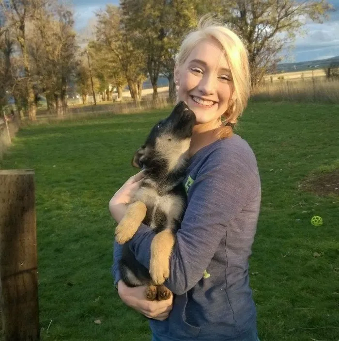 The Little Runt. It Was The First Time She Ever Let Anyone Pick Her Up. We Are Best Friends To This Day!