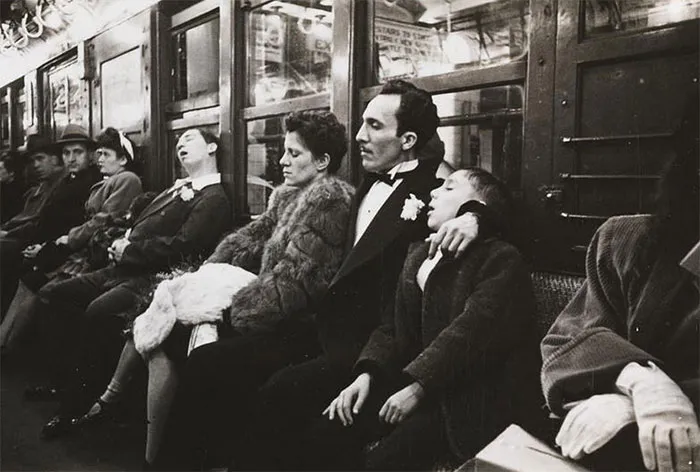 People in 1940s New York subway, captured by young Stanley Kubrick, showcasing a candid moment of daily life.