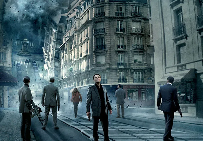 Scene from Inception movie with characters in a city experiencing a dramatic building collapse, a fun fact about movies.