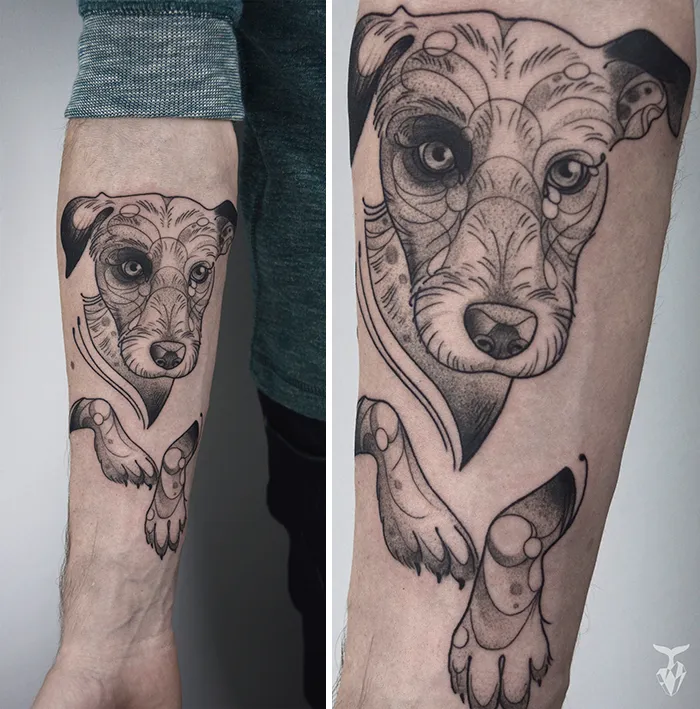 Nature and art nouveau inspired tattoo of a dog's face and paws on a person's arm.