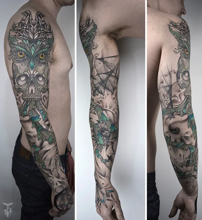 Tattoo sleeve featuring art nouveau and nature-inspired designs on a man's arm.