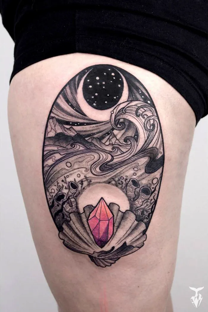 Nature and Art Nouveau inspired tattoo of a crescent moon and crystal seashell design on leg.