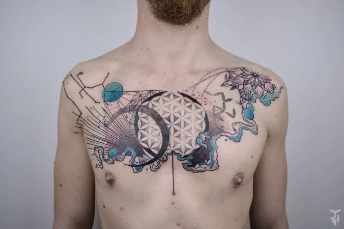 Chest tattoo featuring nature and Art Nouveau elements, with geometric patterns and organic shapes.