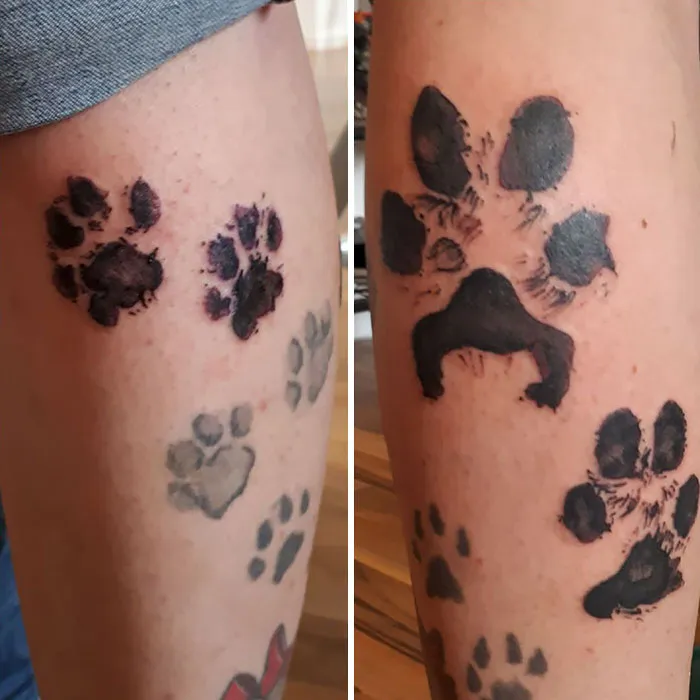 Dog paw print tattoos covering a person's forearm, showcasing detailed and creative designs.