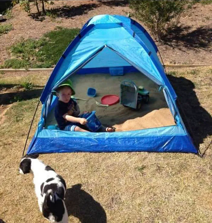We've Used A Small Tent To Make A Sandpit, It's Now Shaded & We Can Close It Up At Night To Keep The Neighbours Cats Out & It Also Stops The Grass Growing Through