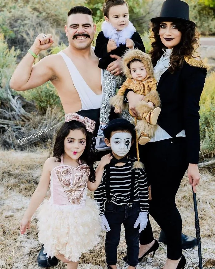 Family dressed in vintage circus performers Halloween costumes