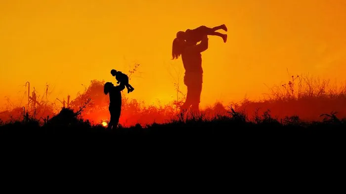 Mom-Daughter Silhouette In The Hungarian Sunset.