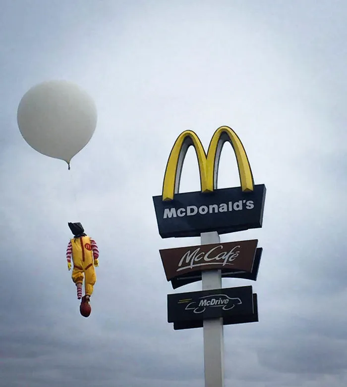 Street Art Artist Hanged Body Of Ronald Mcdonald 20 Meters Above Mcdonald’s Restaurant + Video