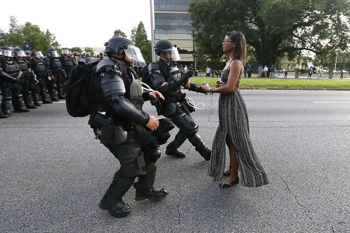 Protester Ieshia Evans Is Detained By Law Enforcement Near The Headquarters Of The Baton Rouge Police Department In Baton Rouge, Louisiana, During A Demonstration Against The Shooting Death Of Alton Sterling, 9 July 2016
